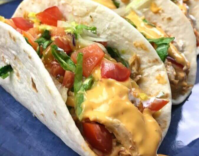 Slow Cooker Queso Chicken Tacos