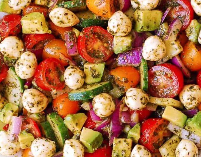 Avocado Salad with Tomatoes, Mozzarella, Cucumber, Red Onions, and Basil Pesto